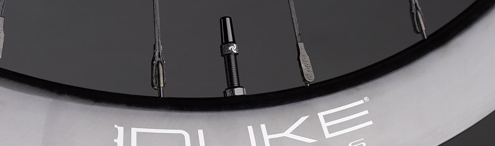 Headerbanner Kategorie Ventile Zubehör Detailaufnahme Felge mit Ventil